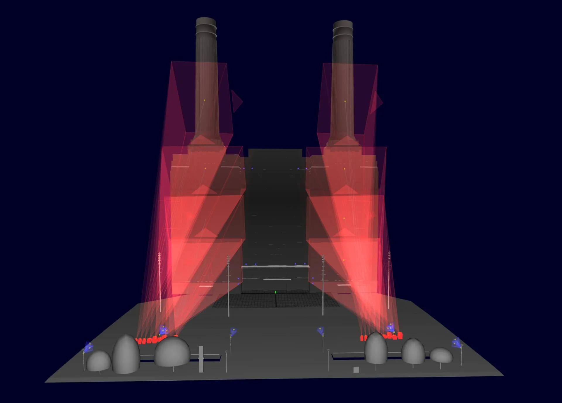 a 3D model of the power station with red projector cones converging on both towers