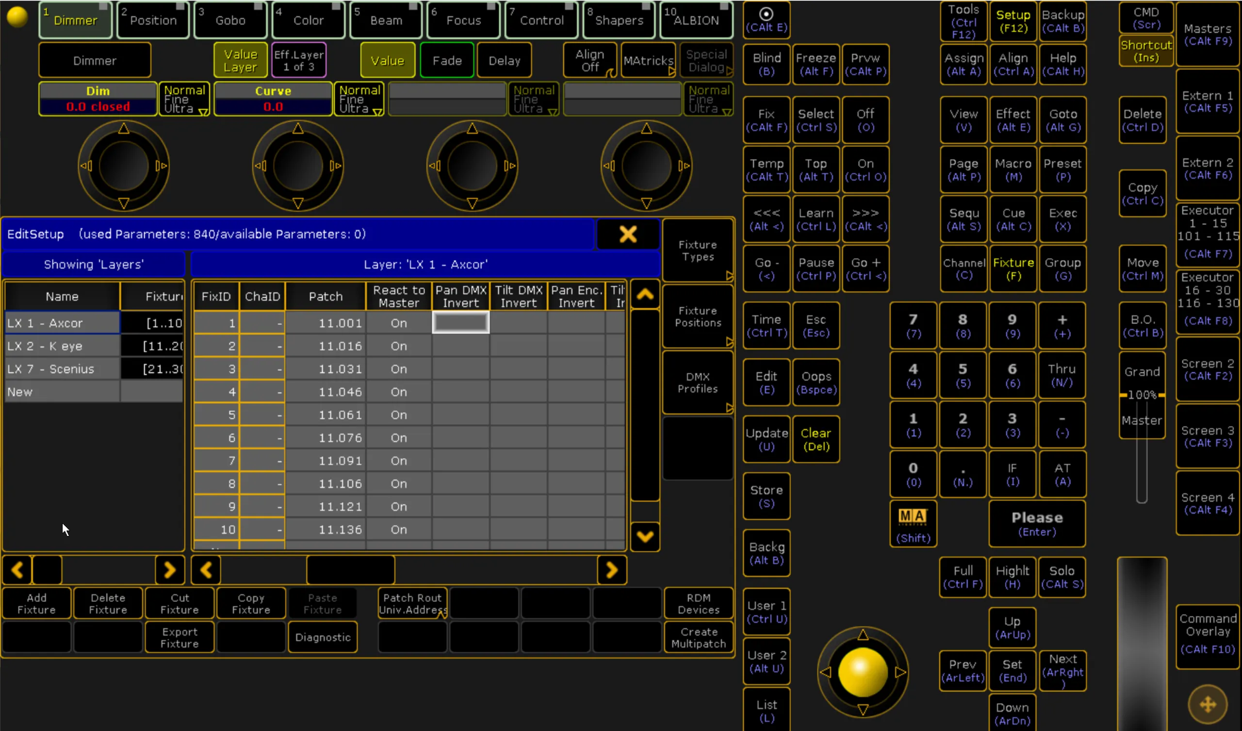 The grandMA EditSetup window on layer LX 1 - Axcor, the Pan DMX Invert cell of fixture 1 selected beside the other Invert columns.