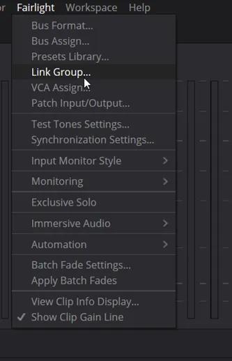 The Fairlight menu open, with Link Group highlighted below Bus Format, Bus Assign and Presets Library.